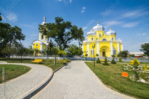 Park before the Russian Orthodox Church building in the center of Comrat capitol of republic of Gagauzia, Moldova photo