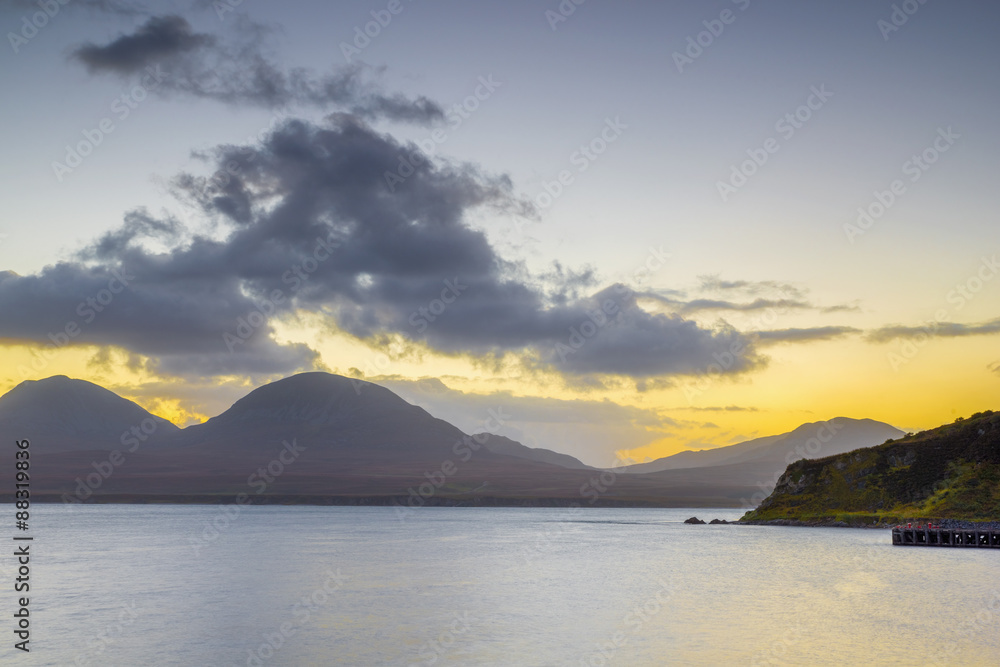 Isle of Jura and Paps of Jura Mountains across Bunnahabhain Bay and Sound of Islay from Islay, Argyll and Bute, Scotland Isle of Jura and Paps of Jura Mountains across Bunnahabhain Bay and Sound of Islay from Islay, Argyll and Bute, Scotland