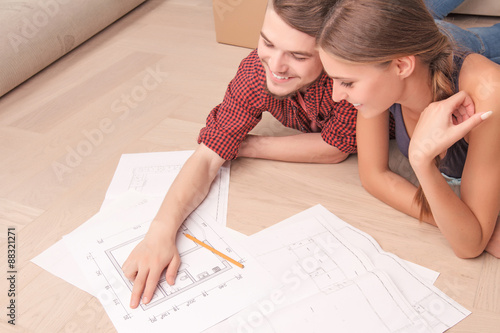 Pleasant couple drawing plan  photo