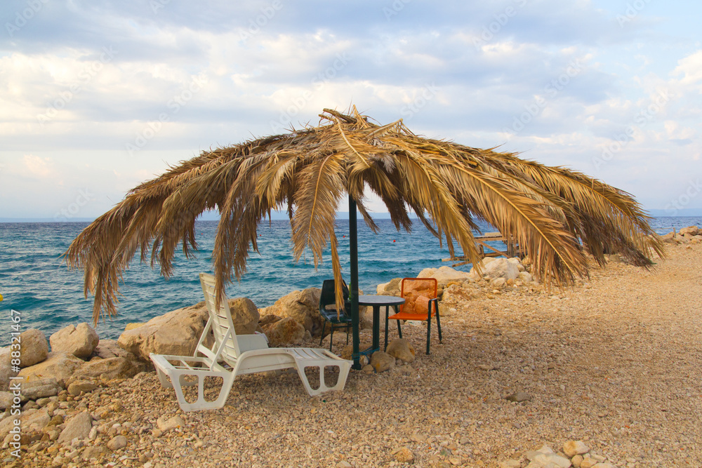 Fototapeta premium Straw parasol