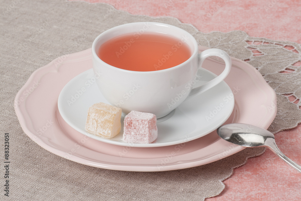 Assorted Turkish Delight. Cup Of Fruit Tea. Natural Linen Napkin Assorted Turkish Delight. Cup Of Fruit Tea. Natural Linen Napkin