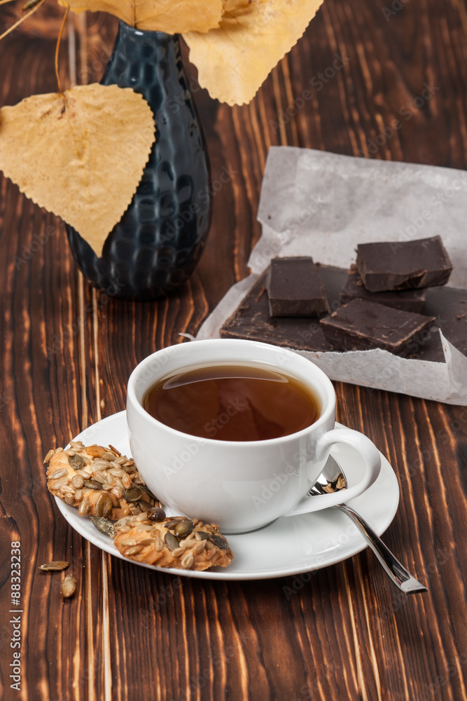 Cup Of Tea Or Coffee. Dark Chocolate. Cookies With Seeds. Wooden
