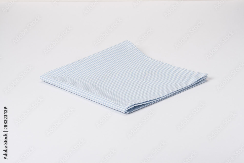 Folded Gingham Cotton Napkin On White Background Folded Gingham Cotton Napkin On White Background