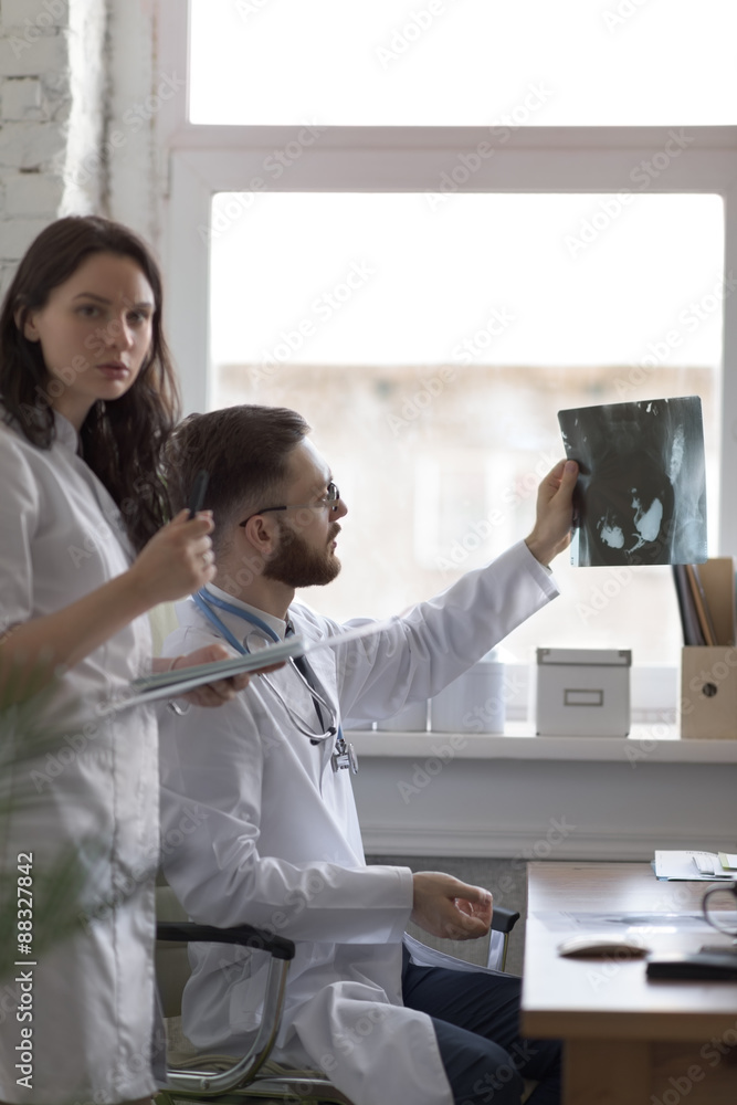 Fototapeta premium Doctors discussing intestines