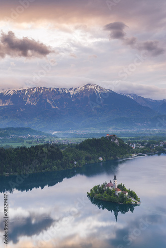 Lake Bled Island and the Julian Alps at sunrise, seen from Osojnica Hill, Bled, Julian Alps, Gorenjska, Slovenia photo