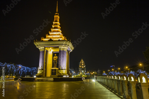 Night photograph of the Statue of Norodom Sihanouk, Phnom Penh, Cambodia #88331876