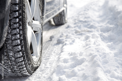 Driving car in winter with much snow photo