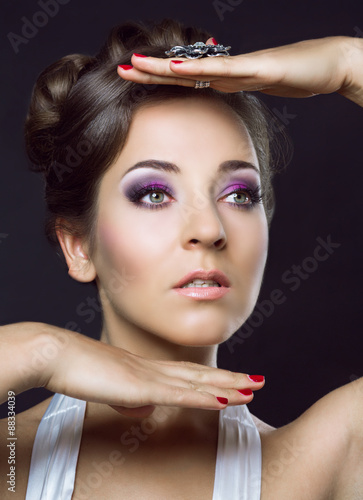 woman with beautiful makeup and hair photo