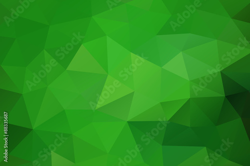 Green abstract geometric rumpled triangular background low poly style. Vector illustration