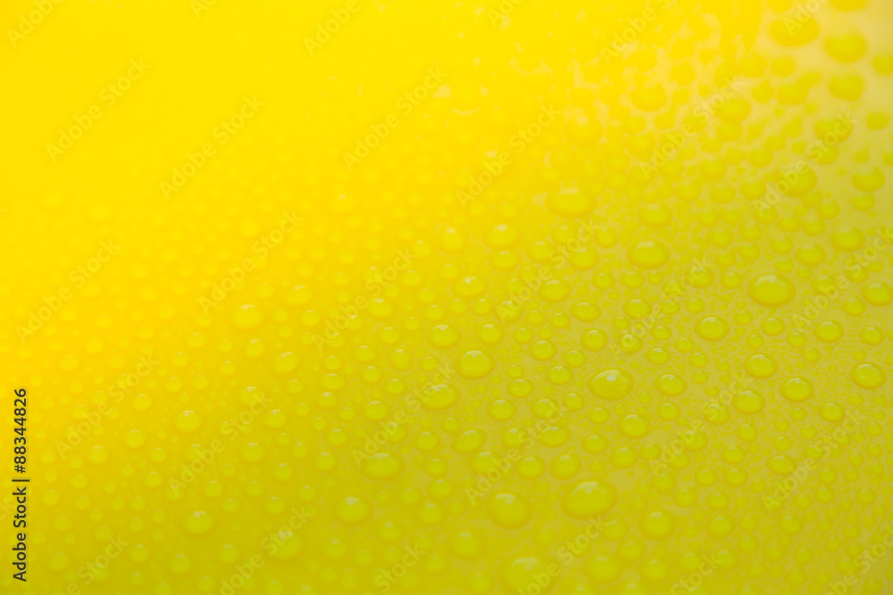 Drops of water on yellow floor Drops of water on yellow floor