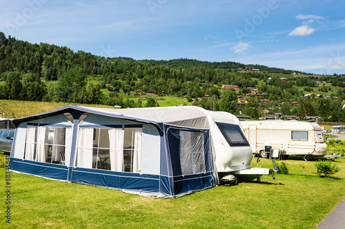 Modern caravan at camping site © Mikkel Bigandt
