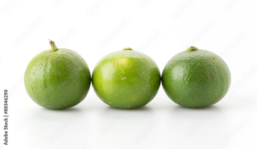 green lemon isolated on white background green lemon isolated on white background