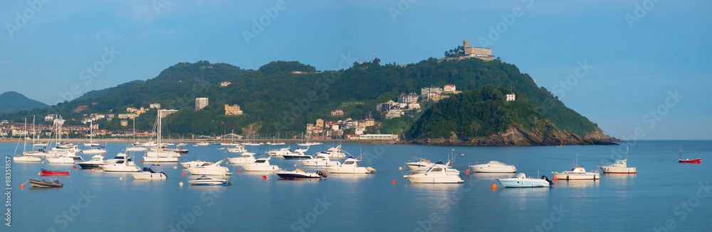 Boats, water and beach in city of Donostia (San Sebastian), Basque Country.