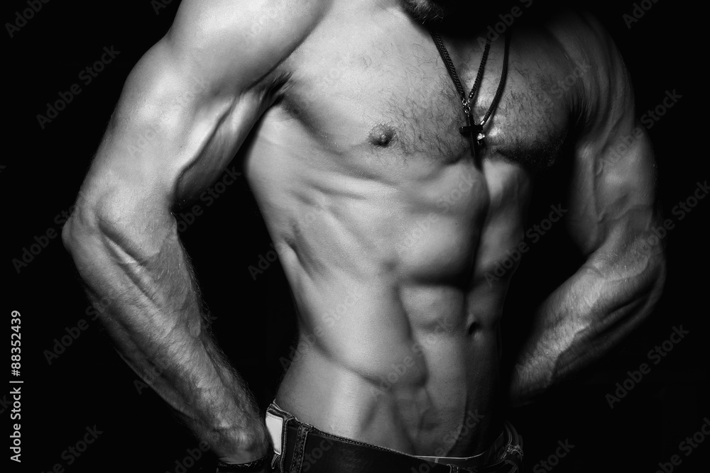 Muscular and sexy torso of young man. Muscular and sexy torso of young man.