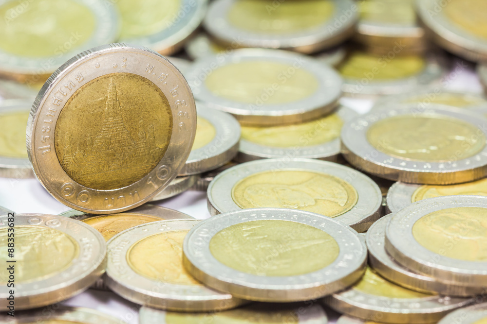 Coins of Thailand. Wat Arun Temple in Bangkok, Thailand, depicted in the Thai ten baht coin. Coins of Thailand. Wat Arun Temple in Bangkok, Thailand, depicted in the Thai ten baht coin.
