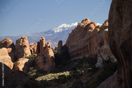 Rock formations with the snow covered La Sal Mountains in the background.Arches National Park, Utah © hberal