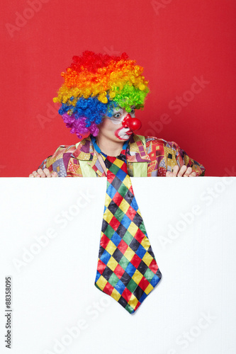 clown with tie on blank white board