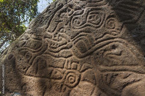 Abstract curvilinear motif petroglyph on rock at Finca Magadalena, Volcan Maderas, Omotepe Island, Lake Nicaragua, Nicaragua photo