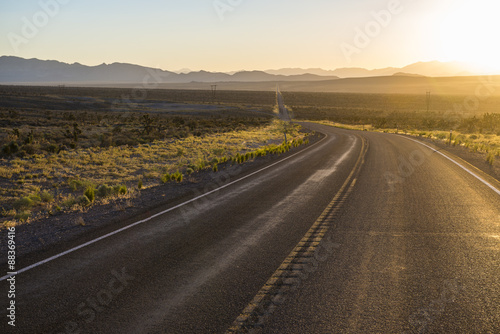 Long winding road at sunset in eastern Nevada
