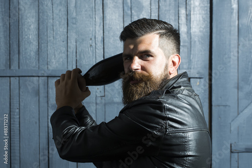 Aggressive man with bottle photo