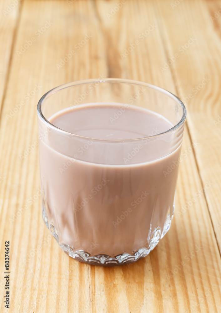 glass of chocolate milkshake on the table glass of chocolate milkshake on the table