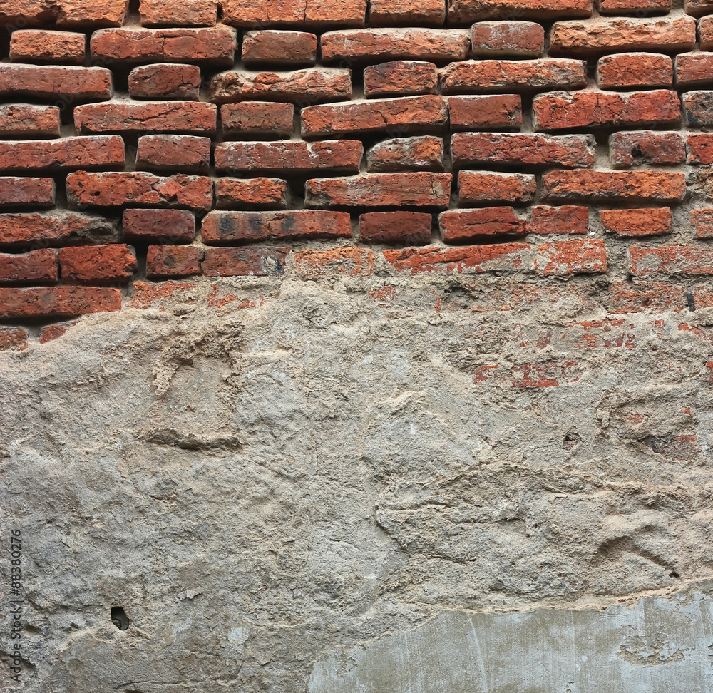 Fototapeta premium cracked concrete vintage brick wall background