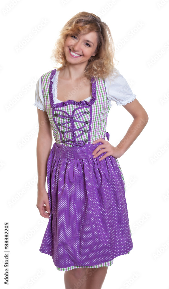 Fröhliche Frau mit blonden Locken im Dirndl Fröhliche Frau mit blonden Locken im Dirndl