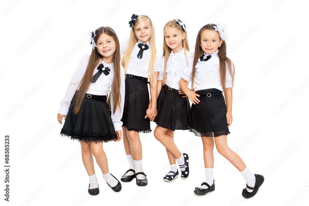 Group of smiling schoolgirls, isolated on white background