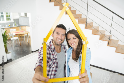Photography young couple happy in a new house