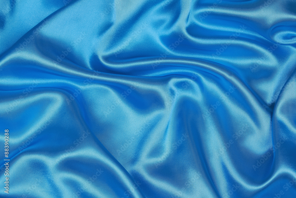 Obraz premium Blue Silk cloth of wavy abstract background