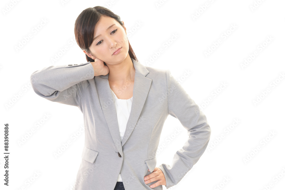 肩こりに悩む女性 肩こりに悩む女性