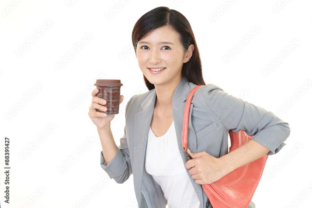 コーヒーを飲むビジネスウーマン