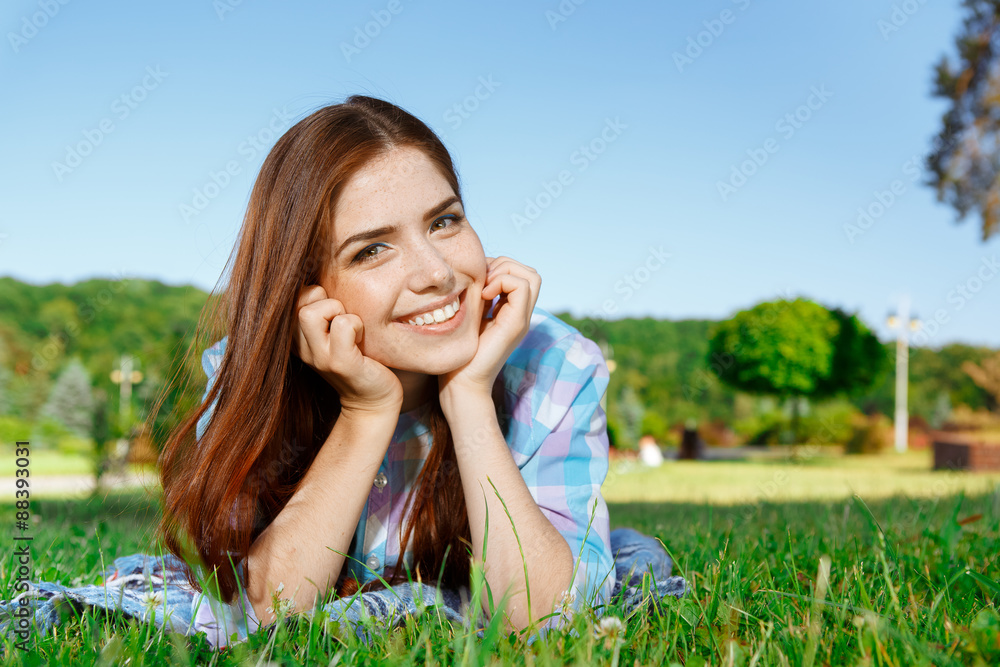 Beautiful girl in park smiling Beautiful girl in park smiling