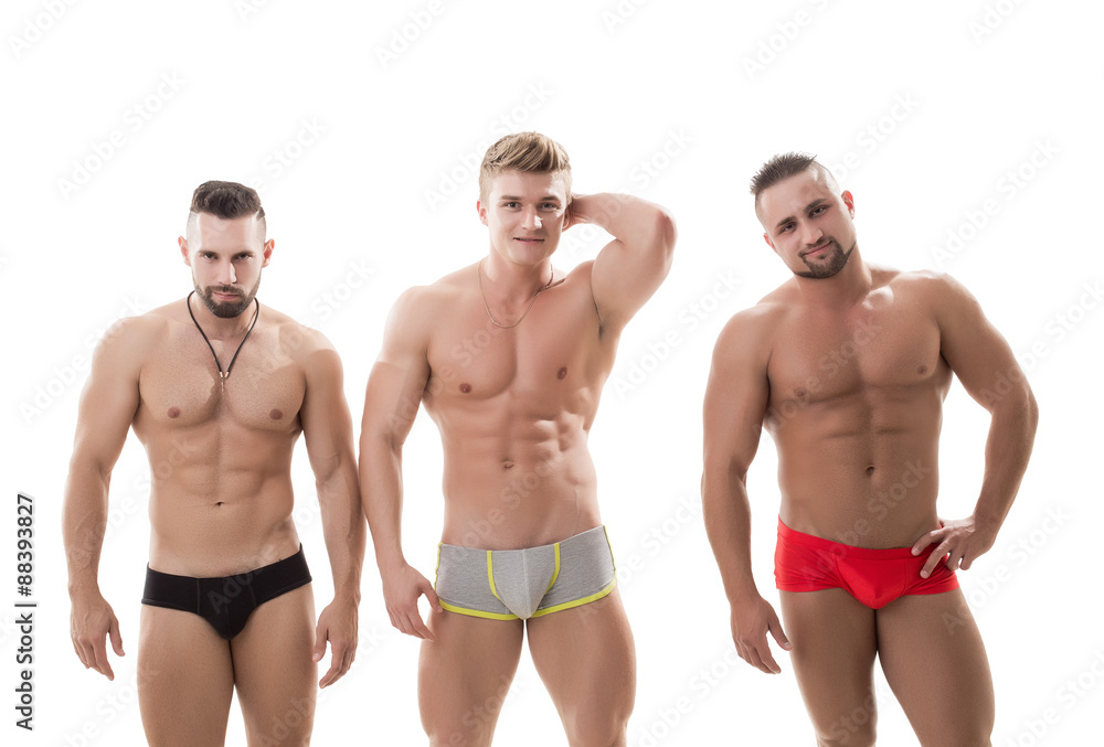 Handsome male models posing in studio Handsome male models posing in studio