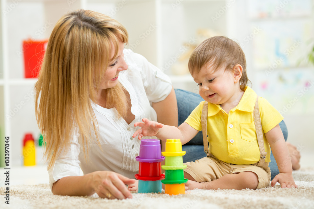 mom and child playing block toys at home mom and child playing block toys at home
