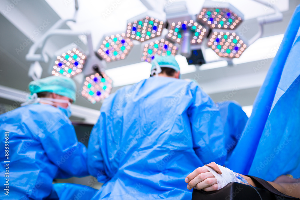 Unidentified boy undergoing a surgery. Focus on the monitor with Unidentified boy undergoing a surgery. Focus on the monitor with