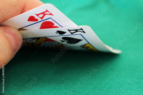 Bild auf Leinwand Poker hand with two kings in a casino