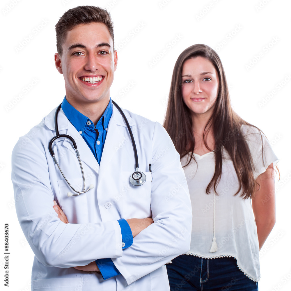 Young medical doctor with patient in background. Young medical doctor with patient in background.