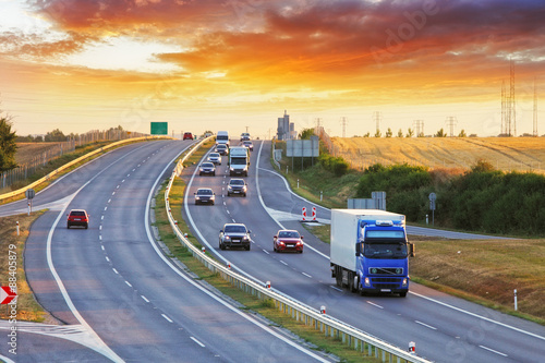 Tableau sur toile Highway transportation with cars and Truck