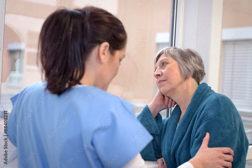Sad patient with nurse Sad patient with nurse