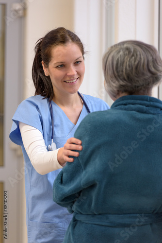 Doctor comforting patient in hospital