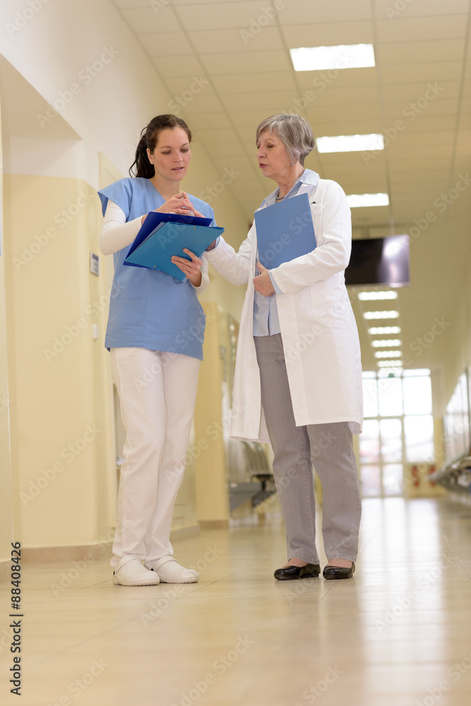 Medical team in hospital corridor Medical team in hospital corridor