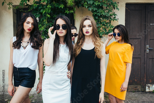 Five beautiful young girls in dresses