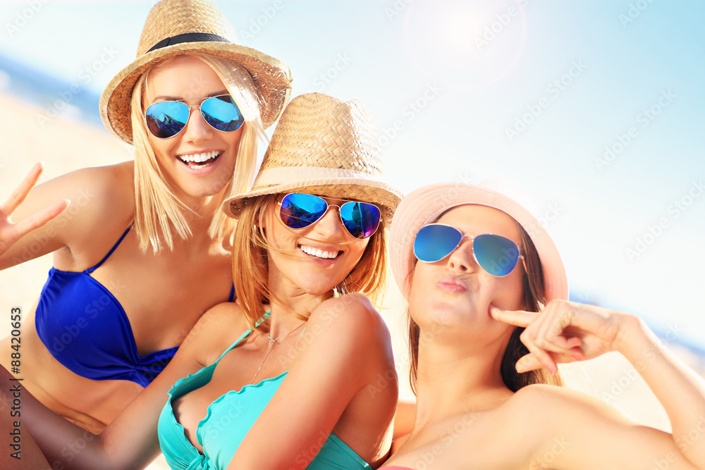 Group of women having fun on the beach Group of women having fun on the beach