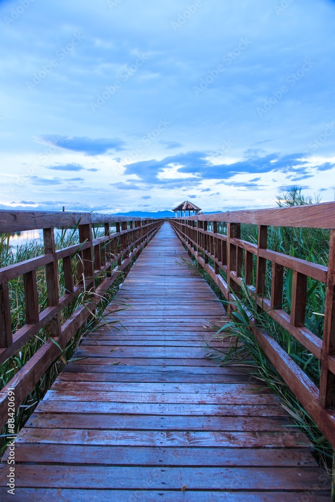 Wooden bridge cross around marsh in sunset time at Sam Roi Yot National Park,Thailand Wooden bridge cross around marsh in sunset time at Sam Roi Yot National Park,Thailand
