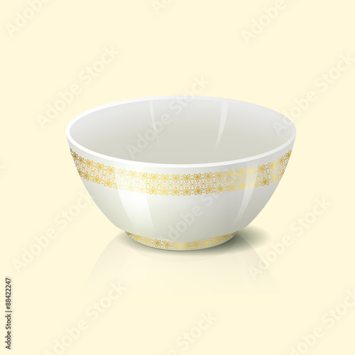 bowl with golden floral ornament and reflection