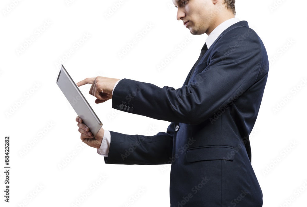 Young handsome businessman with tablet