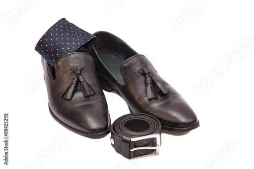 black necktie ,black men's shoes and leather belt © yurchello108