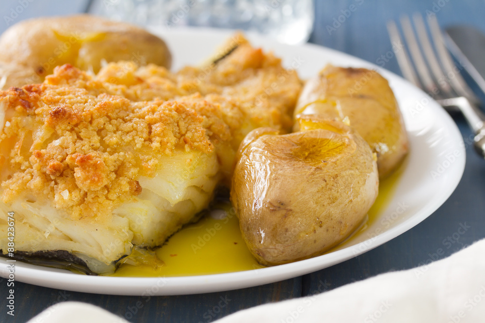 fried fish with potato and oil on white dish fried fish with potato and oil on white dish