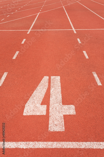 Obraz na płótnie Athletics track lane number four w salonie